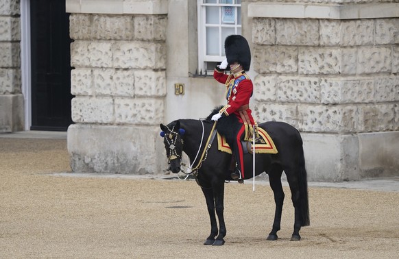 Britain&#039;s Prince William, Colonel of the Irish Guards, salutes during the Colonel&#039;s Review, the final rehearsal of the Trooping the Colour, the Queen&#039;s annual birthday parade, at Horse  ...