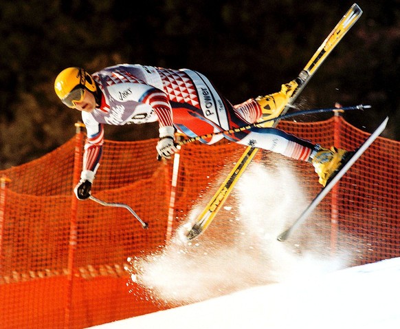 Austrian Patrick Ortlieb takes a high-speed, high-flying tumble during the final training at Kitzbuhel Thursday January 21, 1999, ahead of tomorrow's Men's World Cup Downhill event and suffe ...