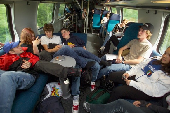 Young Catholics travel by train to Berne, Switzerland, Saturday, June 5, 2004 to attend the Catholic Youth meeting with the participation of Pope John Paul II Saturday evening. The Pope will read an o ...