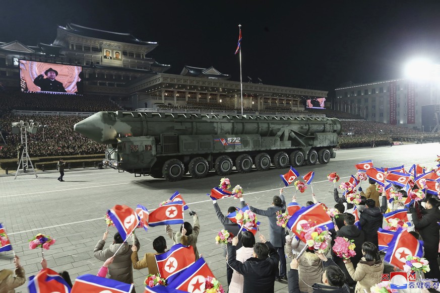 In this photo provided by the North Korean government, what it says are intercontinental ballistic missiles are displayed during a military parade to mark the 75th founding anniversary of North Korea? ...