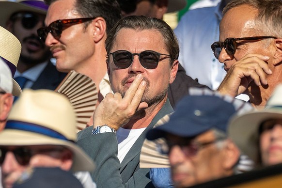 LONDON, ENGLAND - JULY 11: Leonardo DiCaprio watching Jannik Sinner of Italy in action against Novak Djokovic of Serbia in the Semi-Finals of the Gentlemen&#039;s Singles Competition on Centre Court d ...
