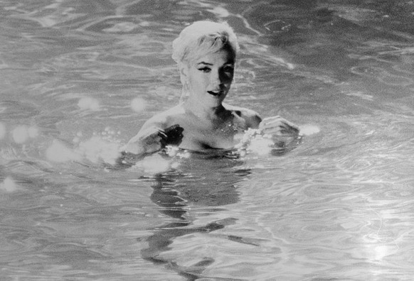 Marilyn Monroe, playing Ellen Arden, swims naked in Something's Got to Give. The movie was never completed due to Monroe's sudden death during production.