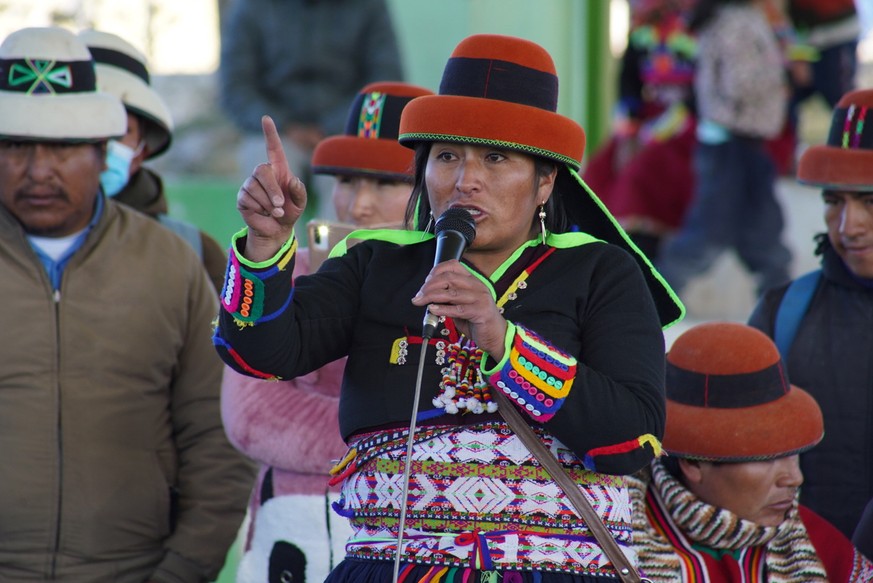 epa10005021 A handout photo made available by the Presidency of the Council of Ministers of Peru shows one of the meetings between the representatives of the communities and the mining company, which  ...