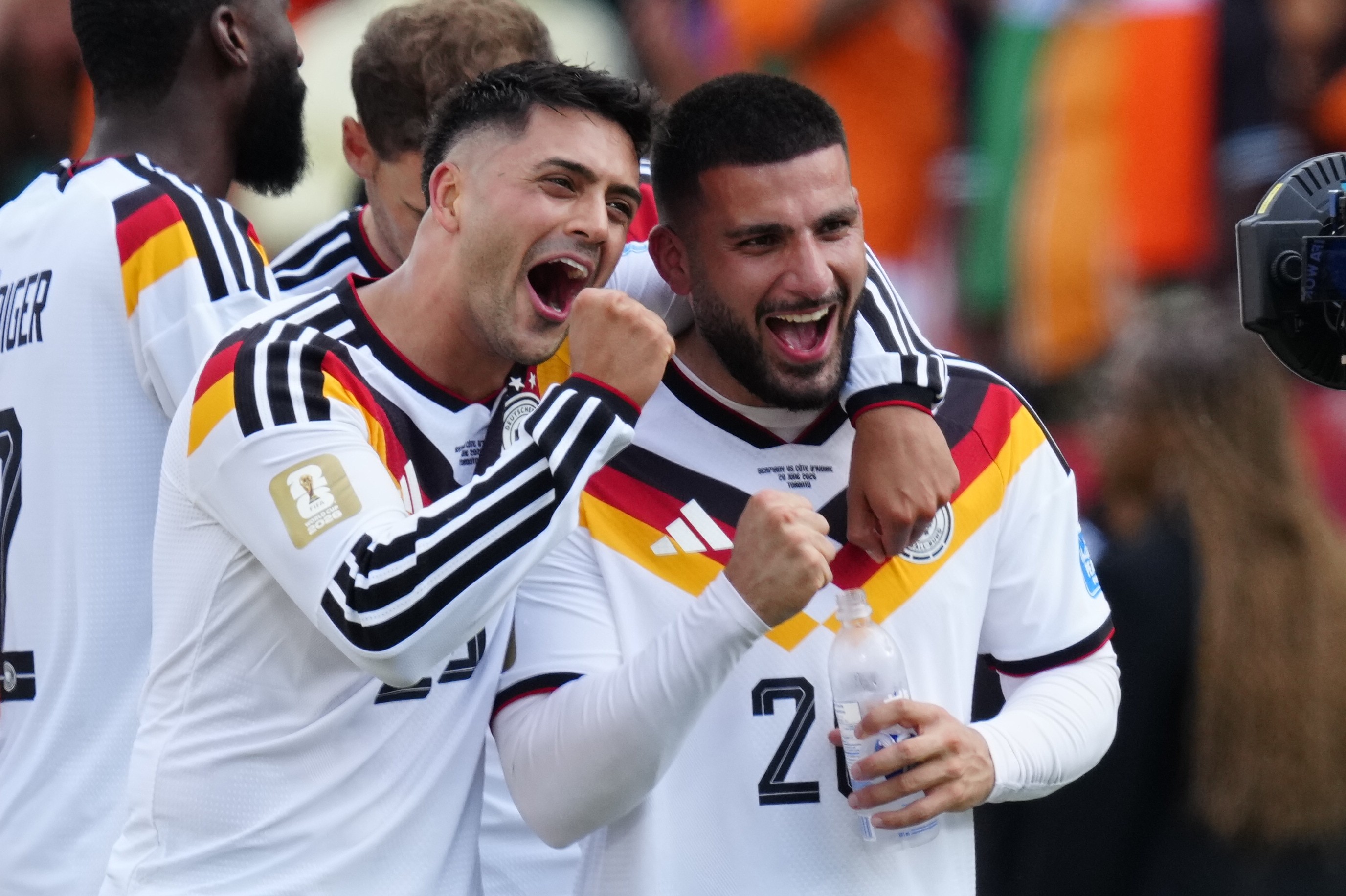 Germany's Nadiem Amiri, left, celebrates with Deniz Undav (26) after the World Cup Group E soccer match between Germany and Ivory Coast in Toronto, Saturday, June 20, 2026. (Frank Gunn/The Canadi ...