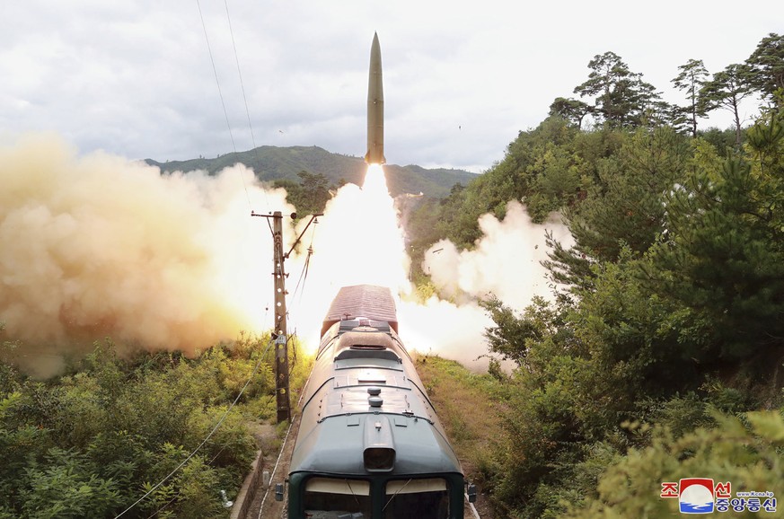 This photo provided by the North Korean government Thursday, Sept. 16, 2021, shows a missile test firing launched from a train on Sept. 15, 2021 in an undisclosed location of North Korea. North Korea ...