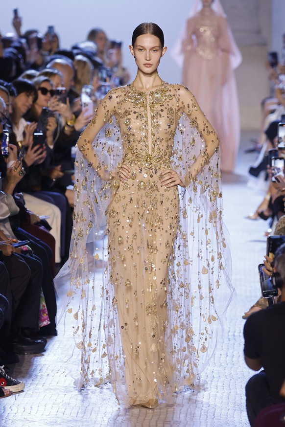 PARIS, FRANCE - JULY 5: (EDITORIAL USE ONLY - For Non-Editorial use please seek approval from Fashion House) A model walks the runway during the Elie Saab Haute Couture Fall/Winter 2023/2024 show as p ...
