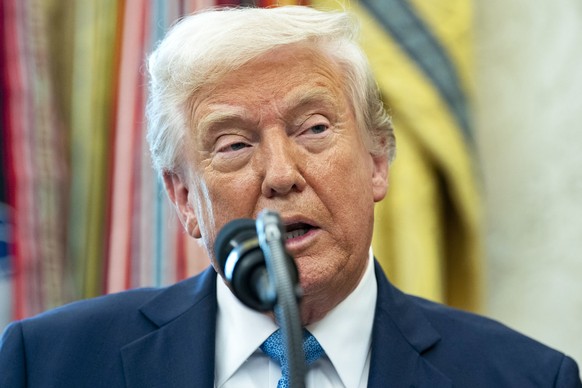 epa12047802 US President Donald Trump speaks during a swearing-in ceremony for Paul Atkins as Chairman of the Securities and Exchange Commission in the Oval Office of the White House in Washington, DC ...