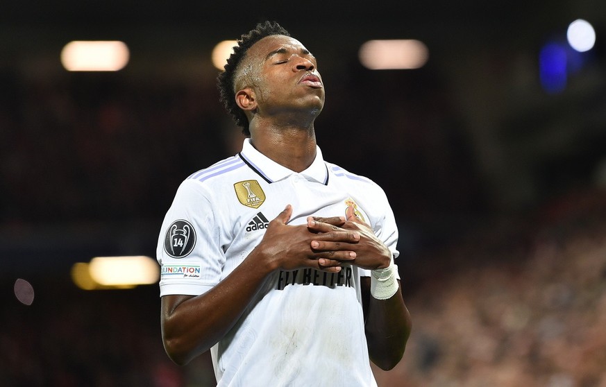 epa10482491 Vinicius Junior of Real Madrid celebrates after scoring his second goal during the UEFA Champions League, Round of 16, 1st leg match between Liverpool FC and Real Madrid in Liverpool, Brit ...