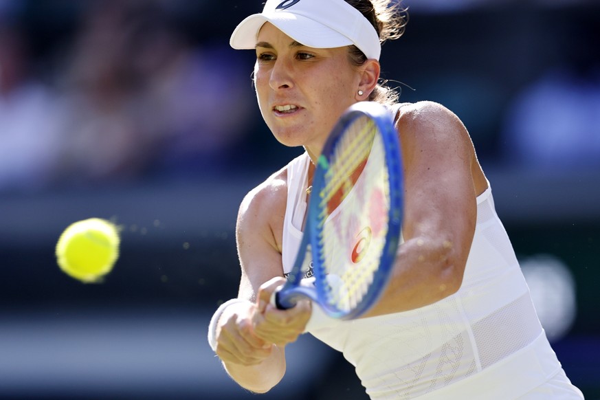 epa12229783 Belinda Bencic of Switzerland in action during her Women&#039;s Singles semi-finals match against Iga Swiatek of Poland at the Wimbledon Championships, Wimbledon, Britain, 10 July 2025. EP ...