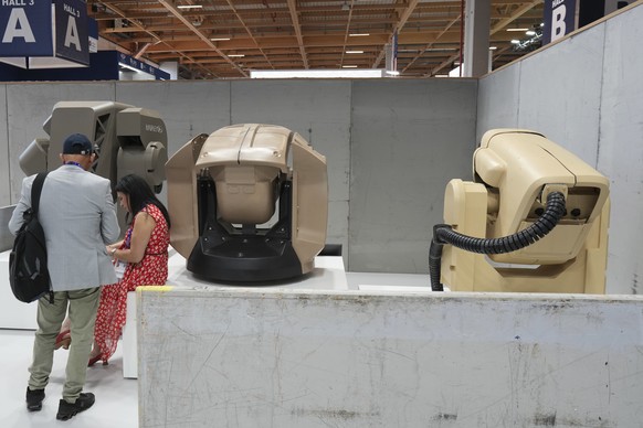 Visitors stand by Iron Beam Laser Weapon System on the Rafael stand in the Israeli pavilion at the Paris Air Show Tuesday, June 17, 2025 in Le Bourget, north of Paris. (AP Photo/Thibault Camus)
France ...