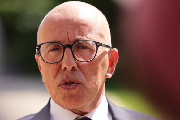 epa11565414 French right-wing party Les Republicains (LR) President Eric Ciotti speaks with the press after the meeting hosted by French president with leaders of the parliamentary groups at the Elyse ...