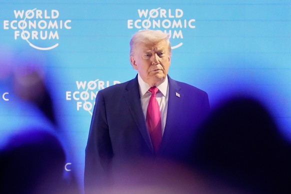 President Donald Trump arrives for his speech during the Annual Meeting of the World Economic Forum in Davos, Switzerland, Wednesday, Jan. 21, 2026. (AP Photo/Markus Schreiber)