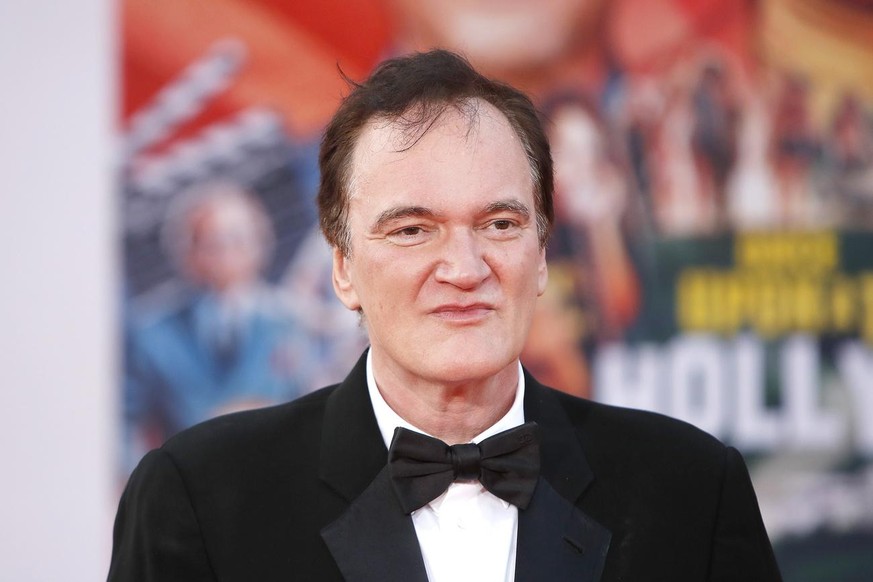 epa07734561 US director/producer Quentin Tarantino arrives for the premiere of 'Once Upon a Time in Hollywood' at the TCL Chinese Theatre IMAX in Hollywood, Los Angeles, California, USA, 22 ...