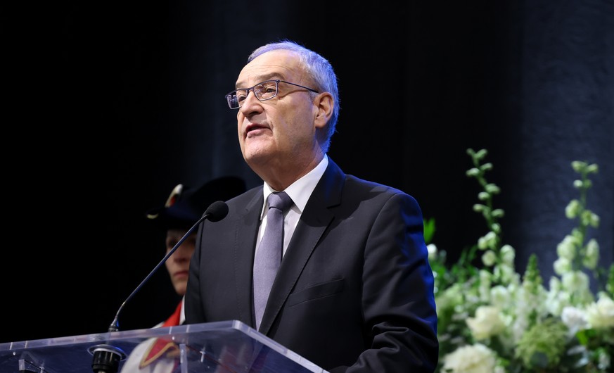 epa12638457 Swiss President Guy Parmelin delivers a speech during an official commemorative ceremony as part of a national day of mourning following the deadly fire at the 'Le Constellation' ...