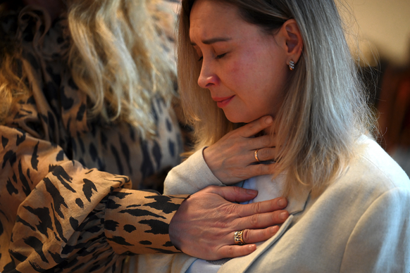 La psychothérapeute Tetiana Moïsseïeva dirige une session de formation psychologique pour les réfugiés ukrainiens au Club des femmes ukrainiennes à Varsovie, le 30 janvier 2025.