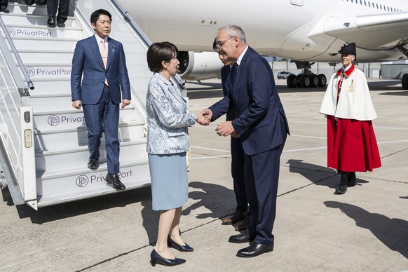 Swiss Federal President Guy Parmelin, right, welcomes Japanese Prime Minister Sanae Takaichi, left, at Geneva Airport prior the G7 summit in nearby Evian (France), in Geneva, Switzerland, Monday, June ...