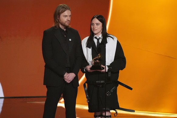 Finneas, left, and Billie Eilish accept the award for song of the year for "Wildflower" during the 68th annual Grammy Awards on Sunday, Feb. 1, 2026, in Los Angeles. (AP Photo/Chris Pizzello ...