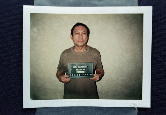 (Original Caption) 1/04/1990-Miami, FL- Ousted Panamanian dictator Manuel Noriega is shown in this Justice Department mug shot released by the U.S. Attorney's office in Miami. Noriega surrendered ...