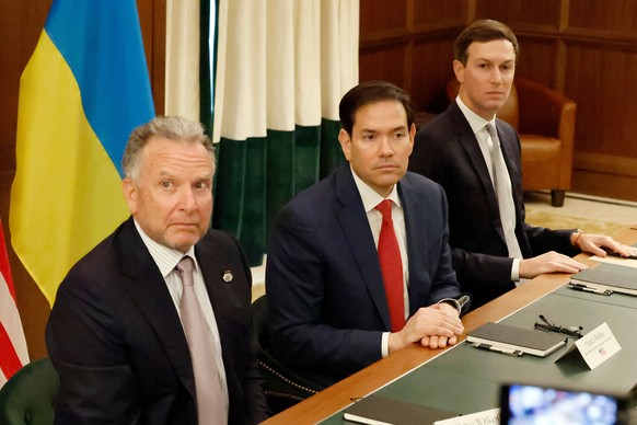 Special Envoy Steve Witkoff, left, Secretary of State Marco Rubio, center, and Jared Kushner attend a meeting with Ukrainian officials Sunday, Nov. 30, 2025, in Hallandale Beach, Fla. (AP Photo/Terry  ...