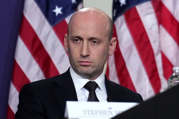 White House deputy chief of staff Stephen Miller, looks on as President Donald Trump participates in a roundtable discussion on public safety at a Tennessee Air National Guard Base, Monday, March 23,  ...