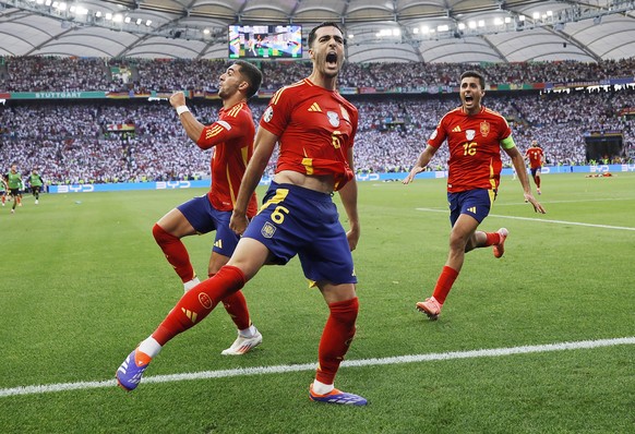 epaselect epa11460433 Mikel Merino of Spain (C) celebrates with teammates after scoring the 2-1 goal during the UEFA EURO 2024 quarter-finals soccer match between Spain and Germany, in Stuttgart, Germ ...