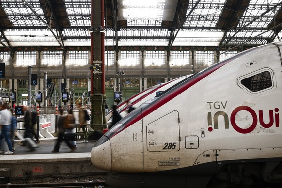 epa13027776 Commuters walk along the platform at Gare de Lyon train station during an SNCF strike in Paris, France, 10 June 2026. Unions called for a national day of protest and a 24-hour strike to op ...