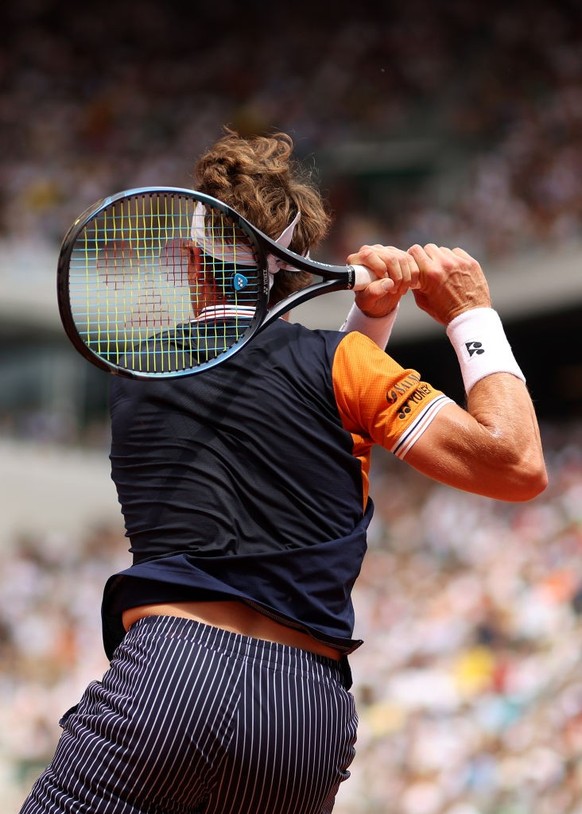 PARIS, FRANCE - JUNE 11: Casper Ruud of Norway plays a backhand against during the Men&#039;s Singles Final match on Day Fifteen of the 2023 French Open at Roland Garros on June 11, 2023 in Paris, Fra ...