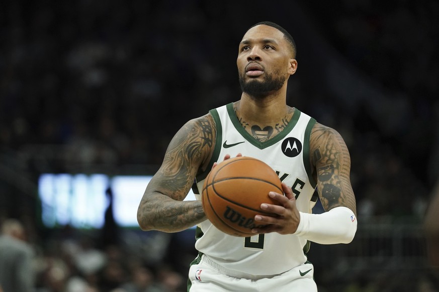 FILE - Milwaukee Bucks' Damian Lillard shoots a free throw during the second half of an NBA basketball game against the Orlando Magic, March 8, 2025, in Milwaukee. (AP Photo/Aaron Gash, File)
Dam ...