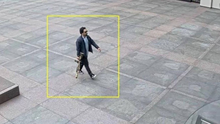 Shane Tamura seen just before shooting multiple people and himself at a New York City skyscraper Shane Devon Tamura, seen walking into a New York City skyscraper holding a gun with which he killed mul ...