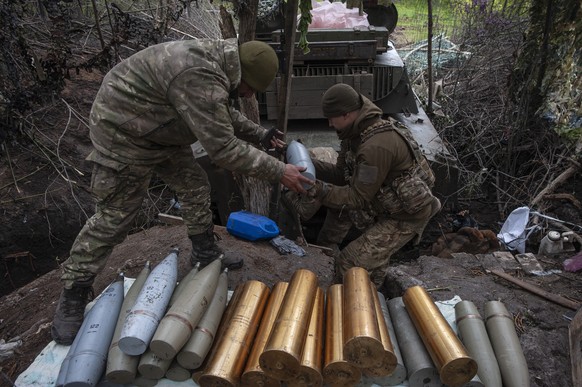 Ukrainian soldiers prepare self-propelled howitzer shells in Chasiv Yar, the site of heavy battles with the Russian forces in the Donetsk region, Ukraine, Thursday, May 11, 2023. (Iryna Rybakova via A ...