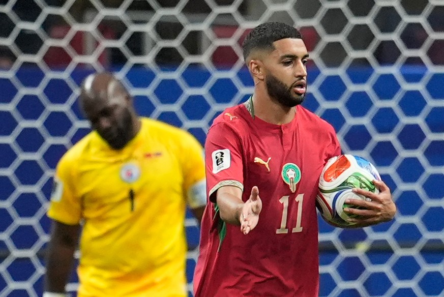 Morocco's Ismael Saibari (11) celebrates after scoring their second goal past Haiti goalkeeper Johny Placide (1) during the World Cup Group C soccer match between Morocco and Haiti in Atlanta, We ...