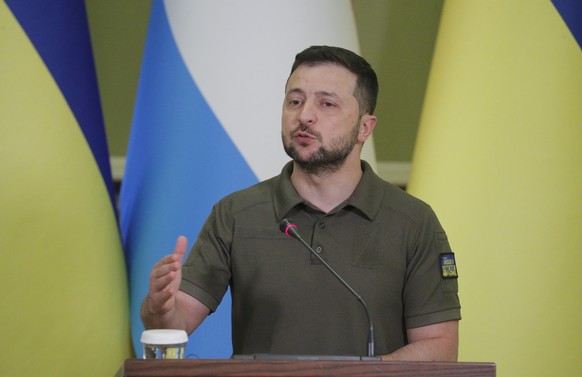 epa10025800 Ukrainian President Volodymyr Zelensky attends his joint press conference with Prime Minister of Luxembourg Xavier Bettel after their meeting in Kyiv, Ukraine, 21 June 2022. Xavier Bettel  ...