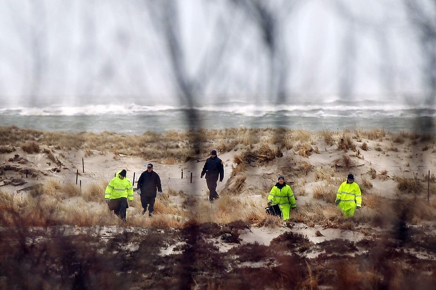 BABYLON, NY - APRIL 05: Suffolk County Police and police recruits search an area of beach near where police recently found human remains on April 5, 2011 in Babylon, New York. Working on the theory of ...