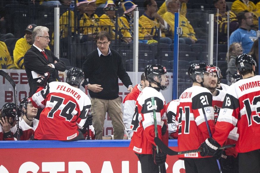 220514 Head coach Roger Bader and assistant coach Arno Del Curto of Austria during the 2022 IIHF Ice hockey, Eishockey World Championship, WM, Weltmeisterschaft game between Sweden and Austria on May  ...