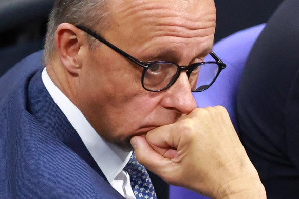 epa11718590 Chairman of the Christian Democratic Union (CDU) party and faction Friedrich Merz looks on during a session at the German Parliament Bundestag in Berlin, Germany, 13 November 2024. German  ...