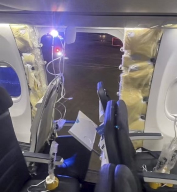 CORRECTS TO 2024, NOT 2023 - This photo provided by an unnamed source shows the damaged part of an Alaska Airlines Boeing 737 Max 9, Flight 1282, which was forced to return to Portland International A ...