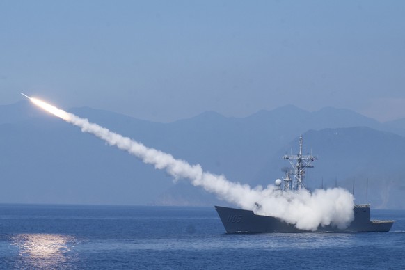 FILE - A Cheng Kung class frigate fires an anti air missile as part of a navy demonstration in Taiwan's annual Han Kuang exercises off the island's eastern coast near the city of Yilan, Taiwan on July ...
