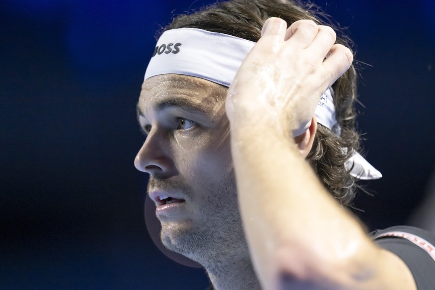 epa12473287 Taylor Fritz of the US looks on as he plays against Monaco&#039;s Valentin Vacherot during their first round match at the Swiss Indoors tennis tournament in Basel, Switzerland, 22 October  ...