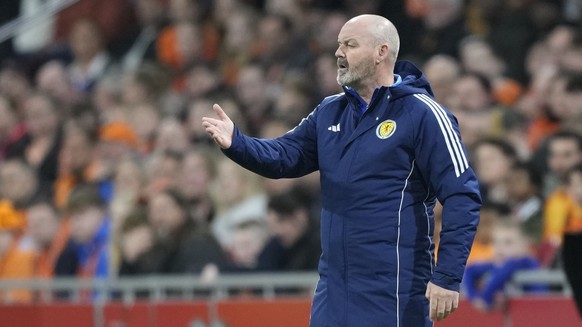Scotland&#039;s head coach Steve Clarke gives instructions from the side line during an international friendly soccer match between Netherlands and Scotland at the Johan Cruyff ArenA, in Amsterdam, Ne ...