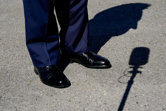 U.S. President Donald Trump's shoes are pictured as he speaks to members of the media upon his arrival at Palm Beach International Airport in West Palm Beach, Florida, U.S., October 31, 2025. REU ...