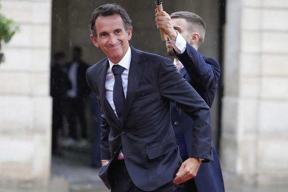 Alexandre Bompard, chairman and CEO of the retail multinational Carrefour, arrives at the Elysee Palace before a stade dinner hosted by French President Emmanuel Macron for Brazil's President Lui ...