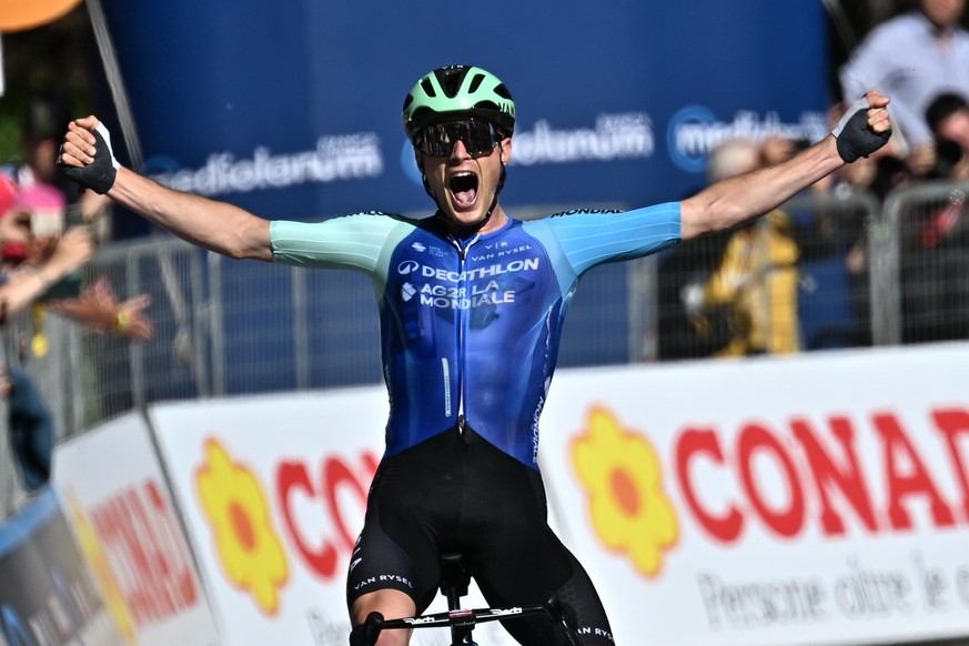 epa12145525 French rider Nicolas Prodhomme of Decathlon AG2R La Mondiale Team celebrates on the podium after winning the 19th stage of the Giro d&#039;Italia cycling race over 166 km from Biella to Ch ...