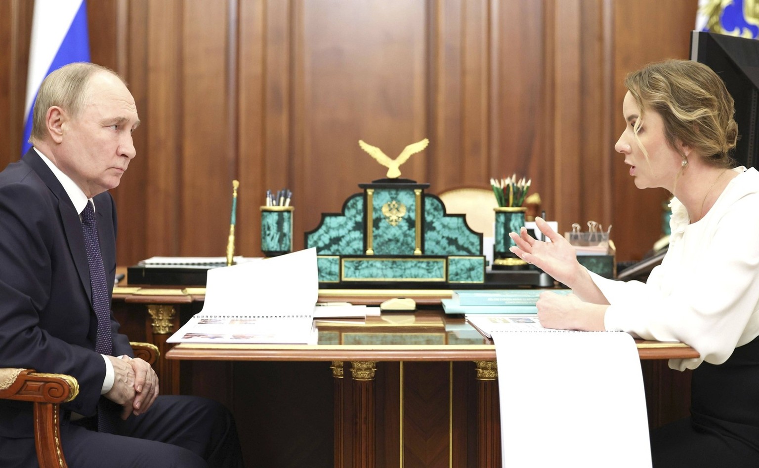 May 31, 2024, Moscow, Moscow Oblast, Russia: Russian President Vladimir Putin, left, listens to Children s Rights Commissioner Maria Lvova-Belova, right, during a face-to-face meeting at the Kremlin,  ...