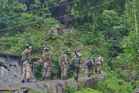 Paramilitary soldiers patrol following overnight shelling from Pakistan at Gingal village in Uri, Indian controlled Kashmir, Friday, May 9, 2025. (AP Photo/Dar Yasin)
India Pakistan