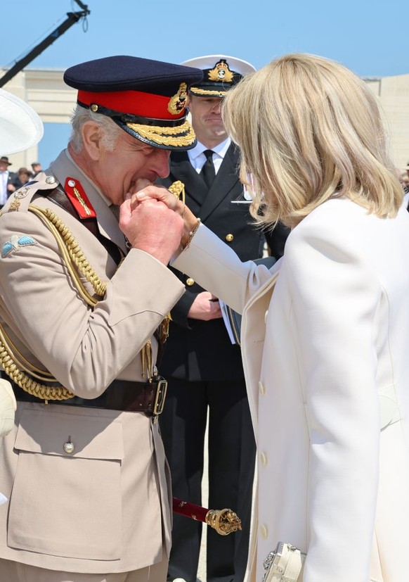 VER-SUR-MER, FRANCE - JUNE 06: King Charles III and Brigitte Macron attend the UK Ministry of Defence and the Royal British Legion’s commemorative event at the British Normandy Memorial to mark the 80 ...