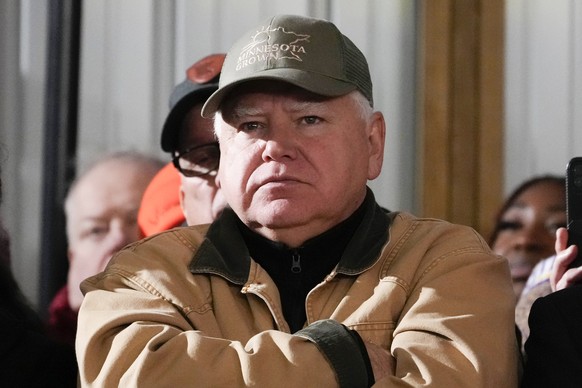 FILE - Minnesota Gov. Tim Walz listens as President Joe Biden speaks at Dutch Creek Farms in Northfield, Minn., Nov. 1, 2023. (AP Photo/Andrew Harnik, File)
Tim Walz