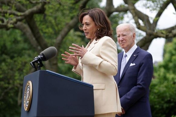 WASHINGTON, DC - MAY 01: U.S. Vice President Kamala Harris (L) speaks as President Joe Biden (R) listens during a Rose Garden event at the White House to mark National Small Business Week on May 1, 20 ...
