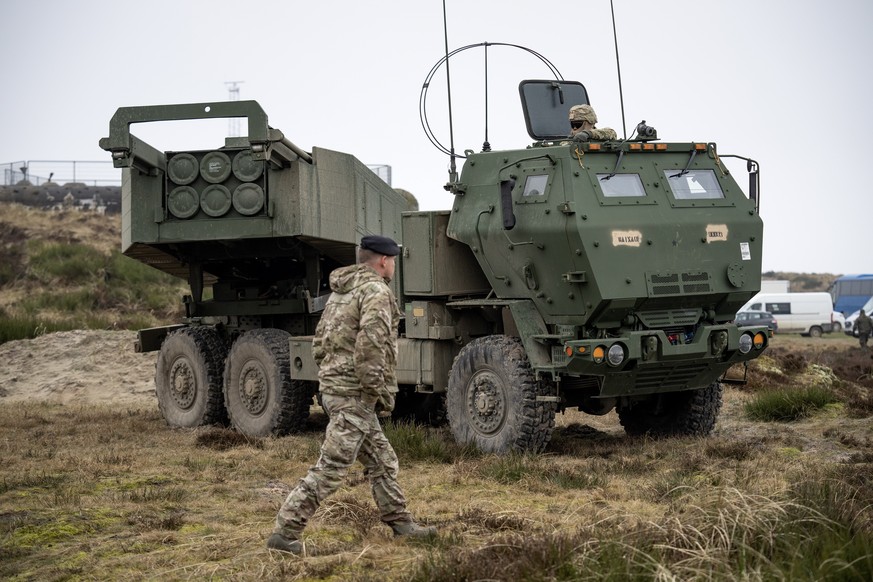 epa10550938 HIMARS, M142 High Mobility Artillery Rocket System is seen during the U.S. Army Europe and Africa military exercise Dynamic Front 2023 at the Oksboel Training and Shooting Range in Denmark ...