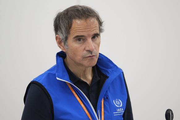 epa10727167 Rafael Mariano Grossi, Director General of the International Atomic Energy Agency, speaks during a news conference at the damaged Fukushima nuclear power plant in Okuma, northeastern Japan ...