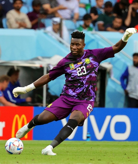 epa10324597 Cameroon's goalkeeper Andre Onana in action during the FIFA World Cup 2022 group G soccer match between Switzerland and Cameroon at Al Janoub Stadium in Al Wakrah, Qatar, 24 November 2022. ...